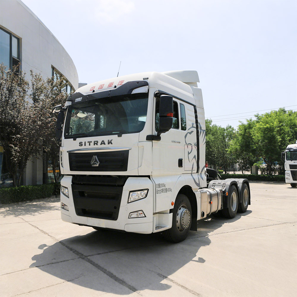 Blue SINOTRUK 6×4 tractor truck showing high-roof cab and MCY13Q rear axle