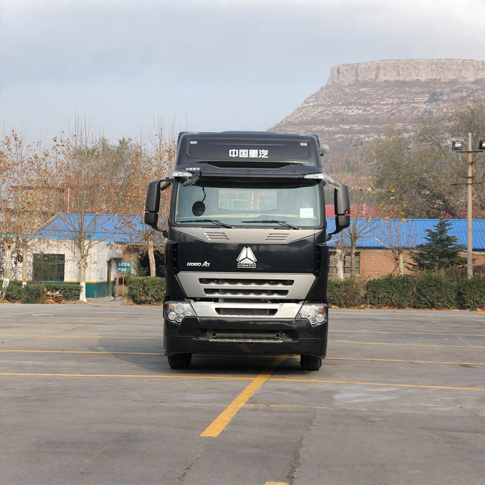 HOWO A7 420HP 6X4 Tractor Truck Front Side View with High-Roof Sleeper Cabin