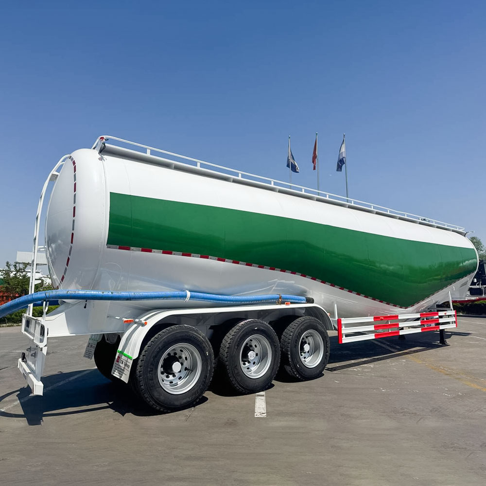 Heavy-duty cement semi-trailer showing W-shaped tank and triple 20T BPW axles