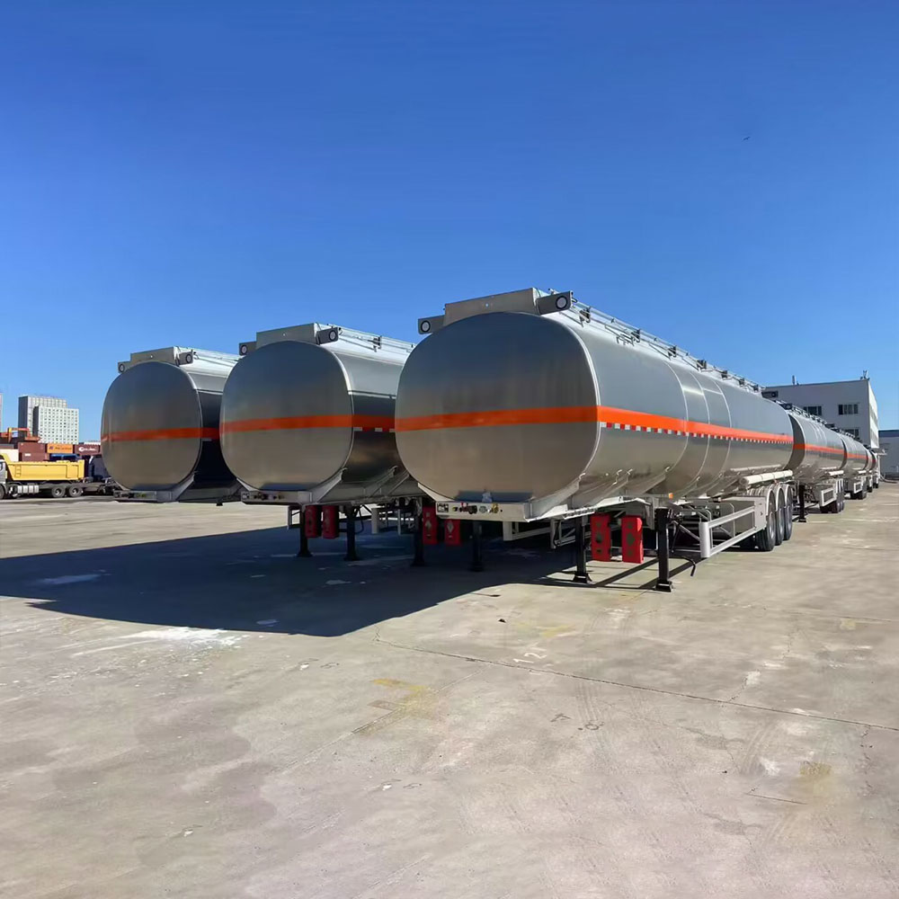 ZW 3 axle aluminum tanker semi trailer with raw alloy finish and orange stripe, optimized for long-distance oil transport.
