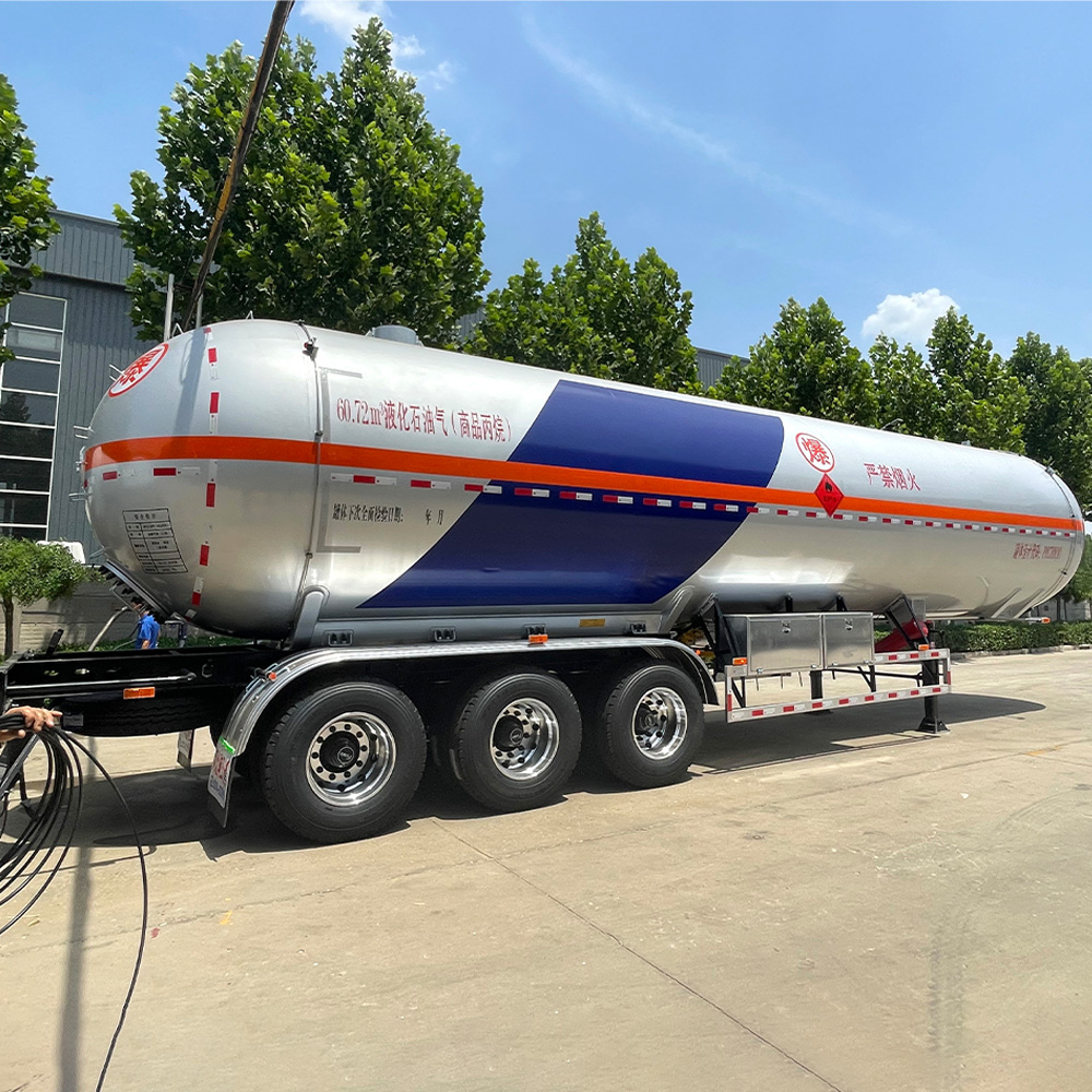 3 axle LPG tanker semi-trailer with carbon steel construction and triple-axle configuration for bulk gas transport.