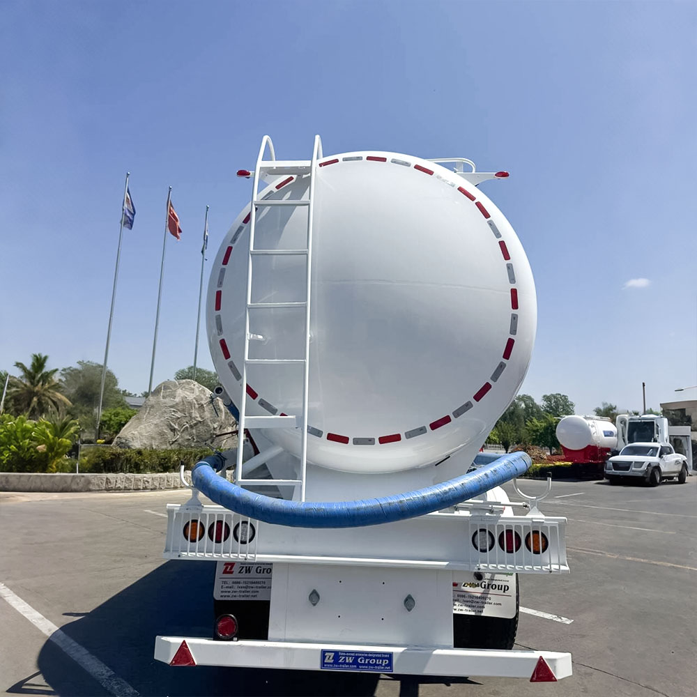 Heavy-duty cement semi-trailer showing W-shaped tank and triple 20T BPW axles