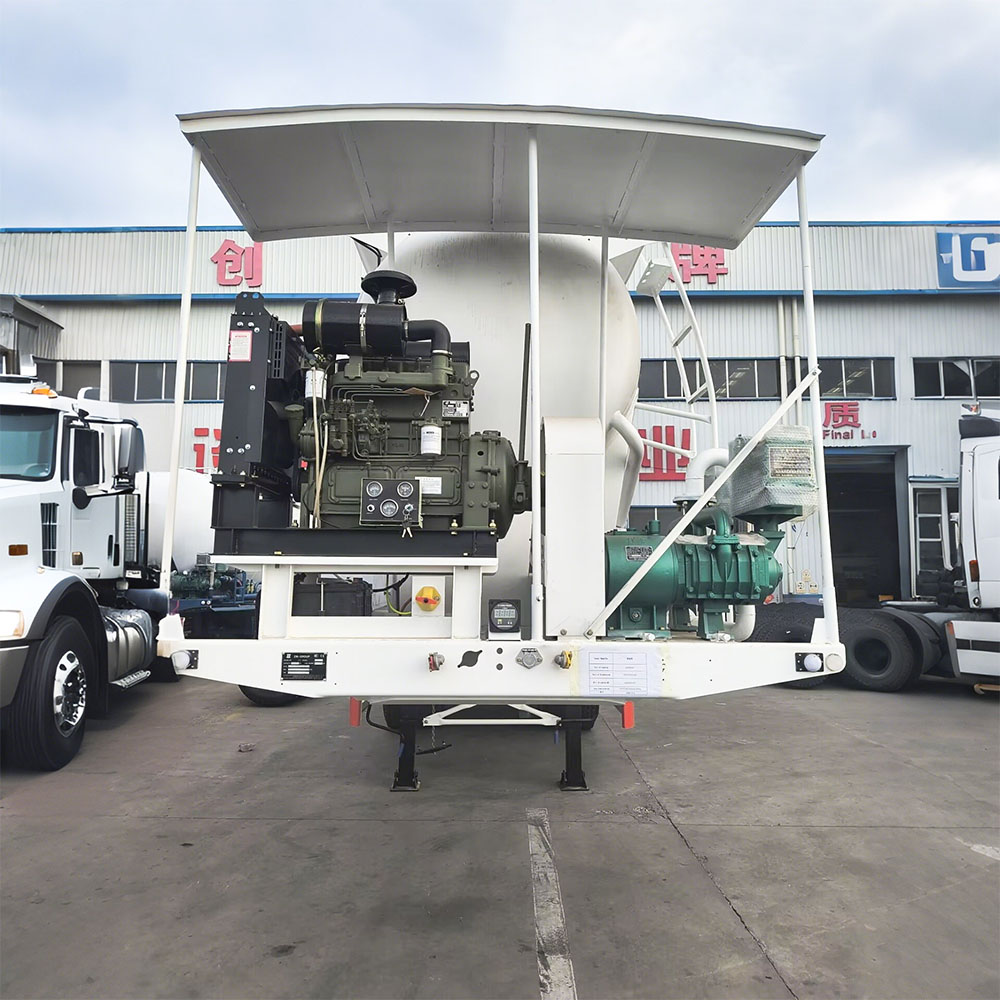 V-shaped cement powder trailer showing discharge valve and dual manholes