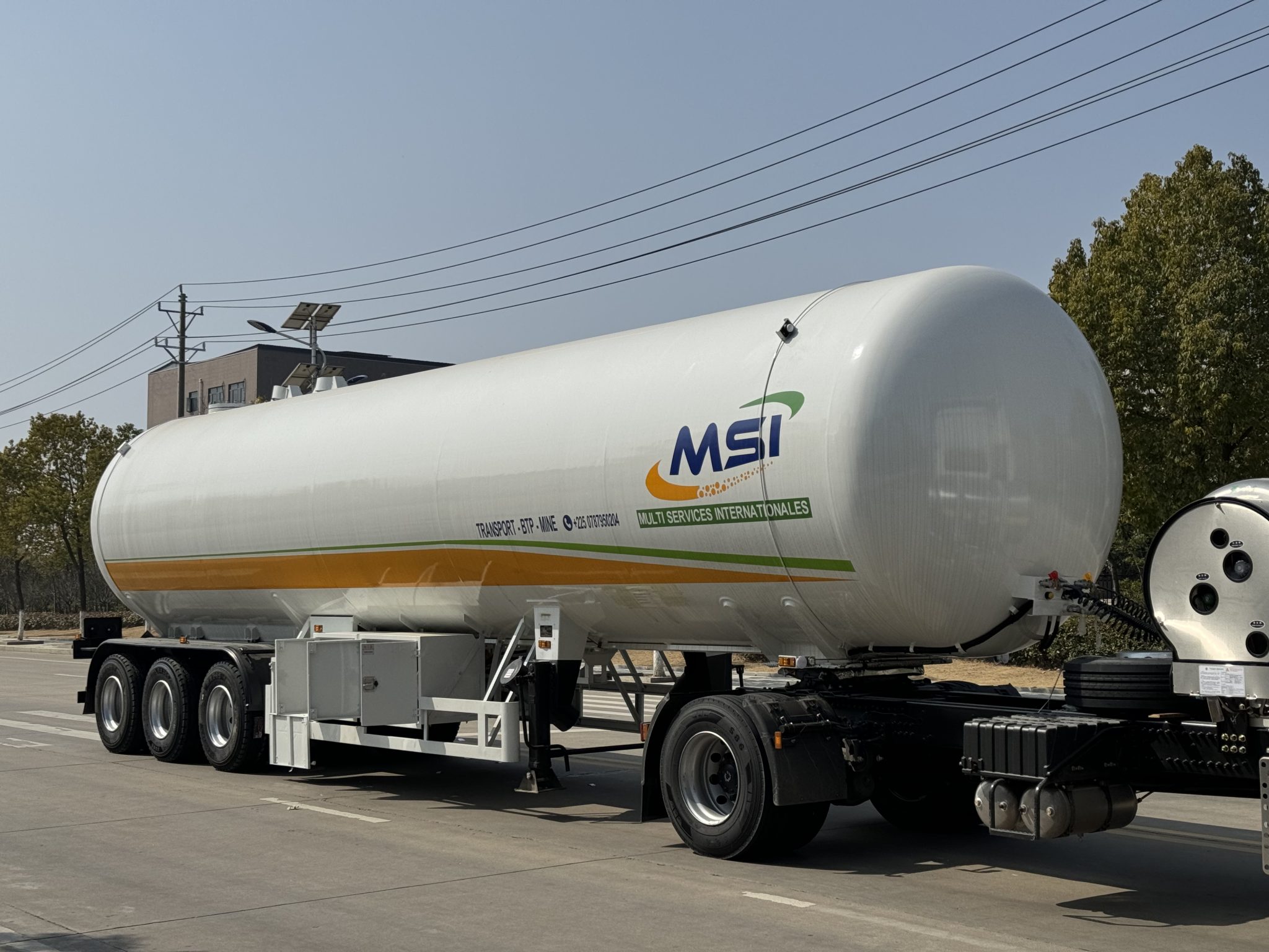Heavy-duty LPG tanker trailer with air suspension, 3×13T axles, and ADR/DOT safety certifications